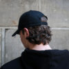 Black Cap with Turquoise Logo
